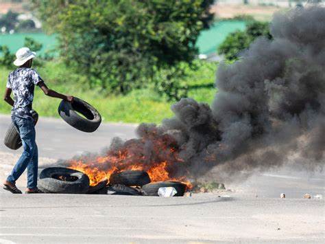 Teargas rocks Jinja city as protesters protest the skyrocketing commodity and fuel prices 